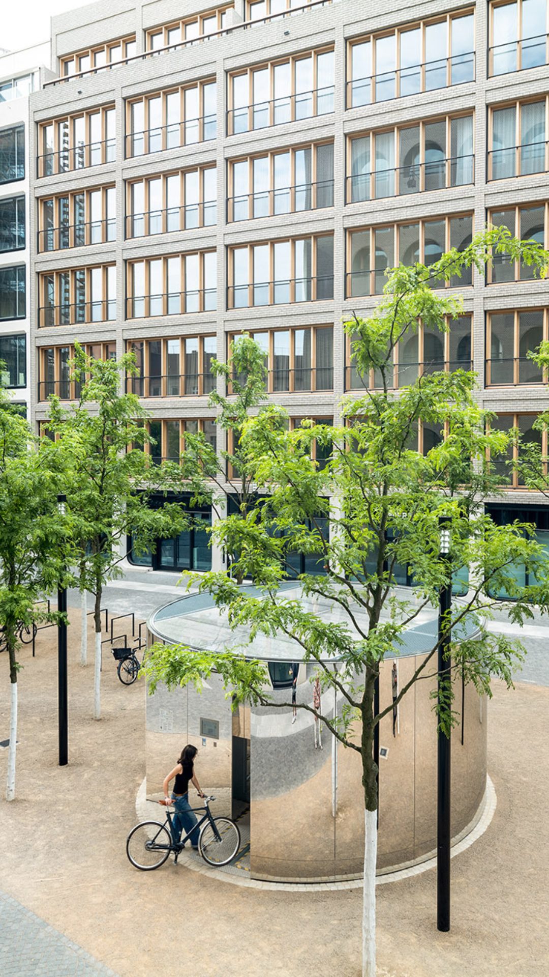 Modern bike parking system blending into the building and surrounds